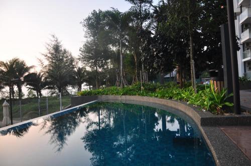 Heavenly@timurbay - 2 Bedroom Poolfront Apartment