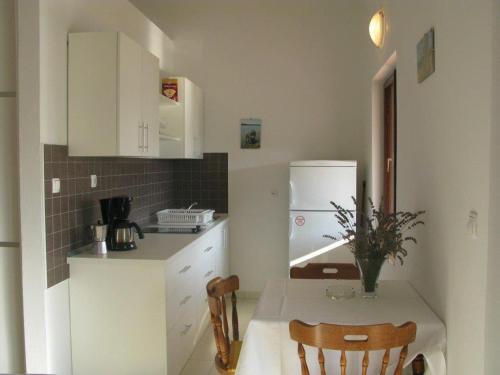 Apartments With A Parking Space Palit, Rab - 16356