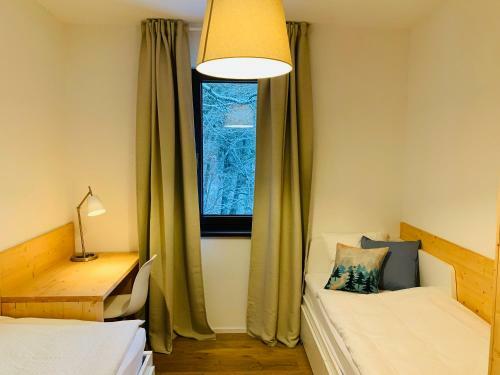 L�?nica Apartments T�le