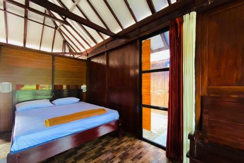 Hotel Rumah Kayu Pinggir Kali Redpartner