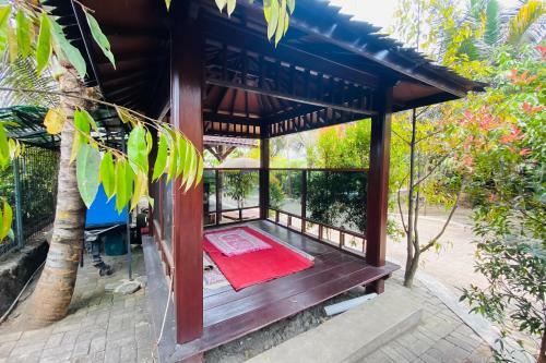 Hotel Rumah Kayu Pinggir Kali Redpartner