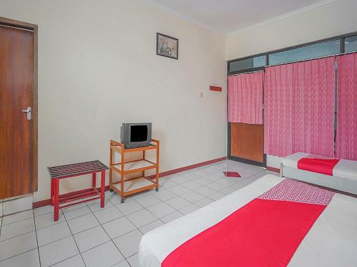 Oyo 90132 Lie Mas Hotel