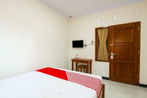 Hotel Oyo 90636 Happy Syariah