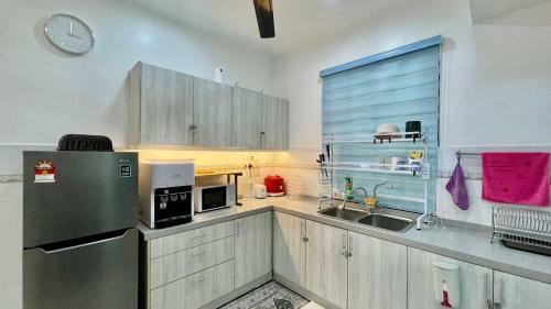 Apartamento Puteh Homestay