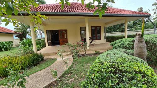 Welcome To Our Oasis The Beautiful Bungalow Red