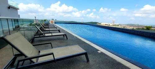 Apartamento Hostahome Suites At D'pristine Opposite Theme Park