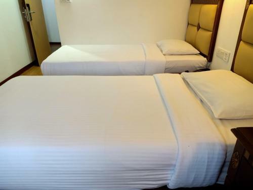 Oyo 90464 Borneo Suites Hotel