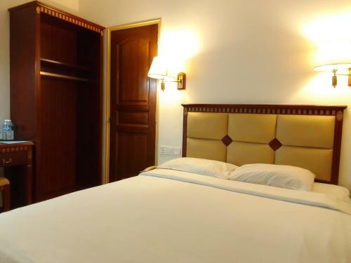 Oyo 90464 Borneo Suites Hotel