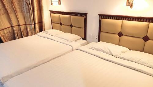 Oyo 90464 Borneo Suites Hotel