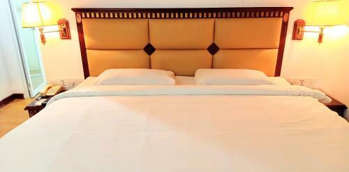 Oyo 90464 Borneo Suites Hotel