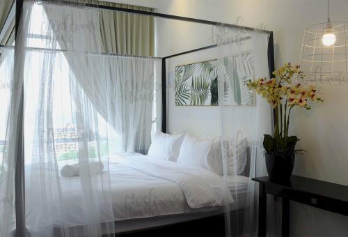 Apartamento Paragon Suites Ciq Homestay