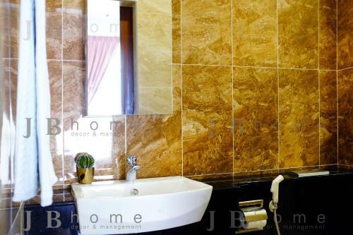 Apartamento Paragon Residences Straits View Homestay
