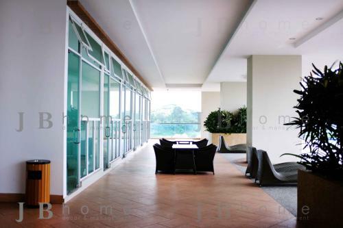 Apartamento Paragon Residences Straits View Homestay