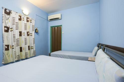 Spot On 89989 Wispering Hotel