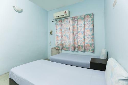 Spot On 89989 Wispering Hotel