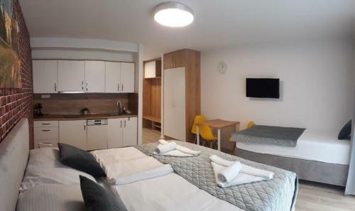 Apartm�nov� D?m Na Kolon�d?