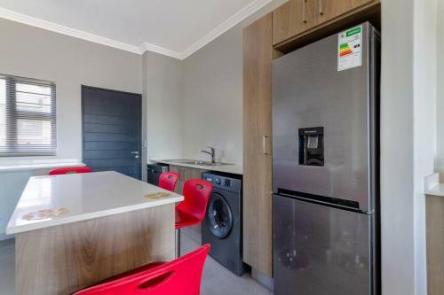 Apartamento Alimama Spaces: The Thando's Kyalami Woods