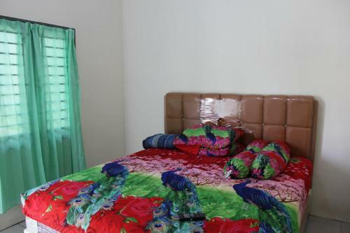 Hostal Penginapan Transit Tomato