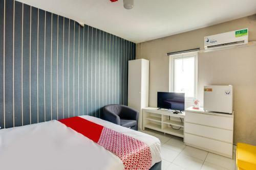 Hotel Oyo 3247 Afira Rooms Aeropolis