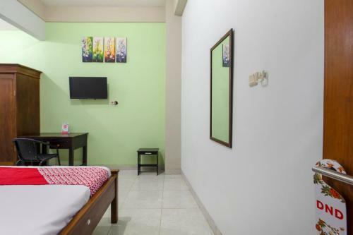Hotel Oyo 3815 Kutisari Selatan 21 Syariah