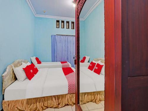 Hotel Oyo 90611 Griya Kutisari V Residence