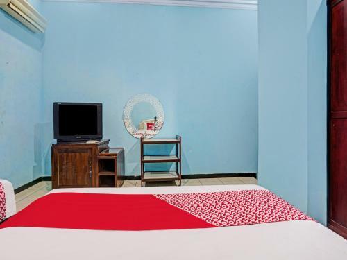 Hotel Oyo 90611 Griya Kutisari V Residence