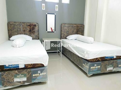 Hotel Boarding House Syariah Mm Bone Redpartner