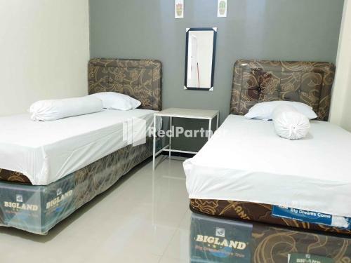 Hotel Boarding House Syariah Mm Bone Redpartner