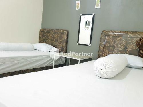 Hotel Boarding House Syariah Mm Bone Redpartner