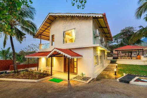 Villa Saffronstays Coral Hues