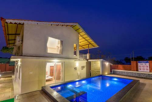 Villa Saffronstays Coral Hues