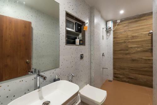 Villa Saffronstays Coral Hues