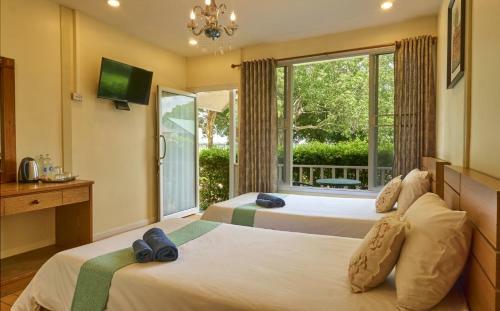 Bed & Breakfast Bo Tree Cottage On The River