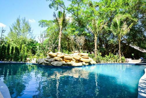 Apartamento The Beachcomber @ Naiyang Beach