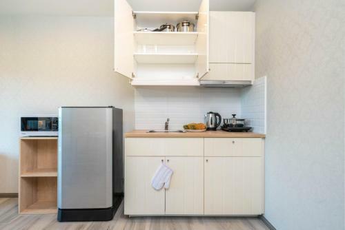 Apartamento The Beachcomber @ Naiyang Beach