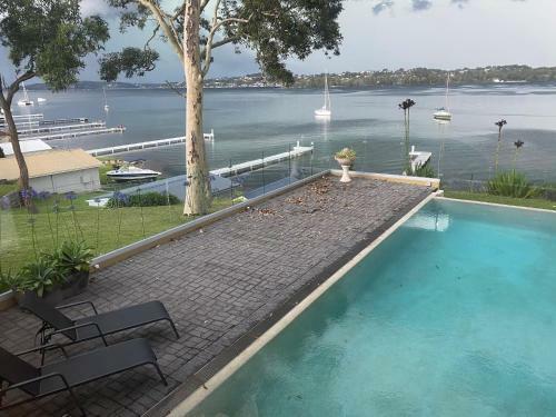 Luxurious Waterfront With Jetty And Boatshed
