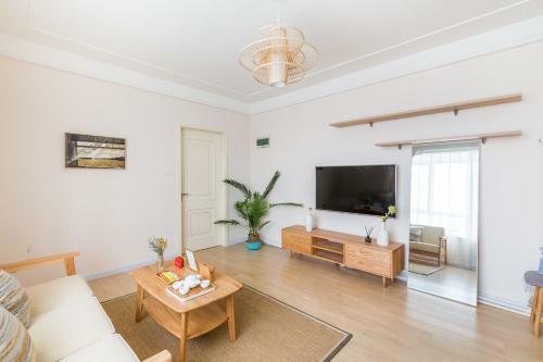 Hotel Qingdao Shinan�wusi Square�