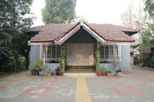 Hotel Whispering Woods By Aura Hospitality