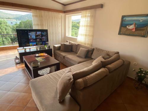 Athenian Riviera Family House