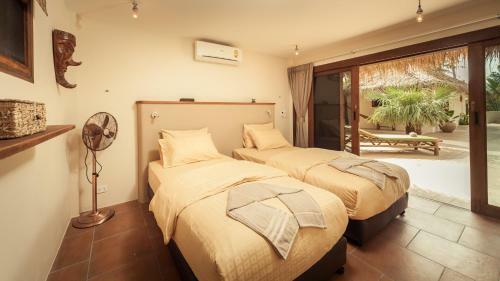 Baan Thamarchat 3 Villas 13 Bedrooms & Shala