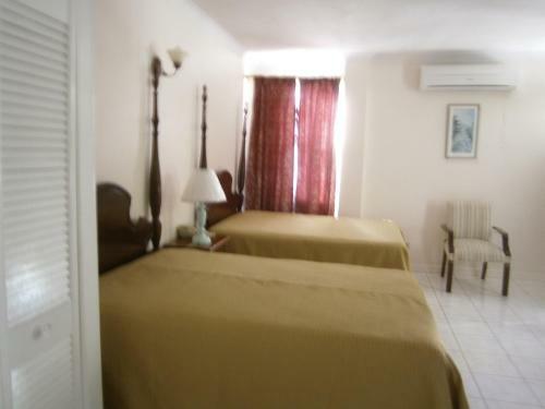 Hotel Whispering Bamboo Cove Resort