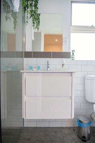 Apartamento Albany Beachside Accommodation
