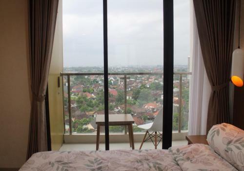Apartamento The Wongso Patraland Amarta