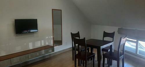 Oyo 1161 Puchin Hotel And Apartment