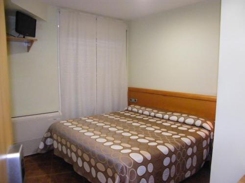 Hostal Amolls Restaurant I Habitacions