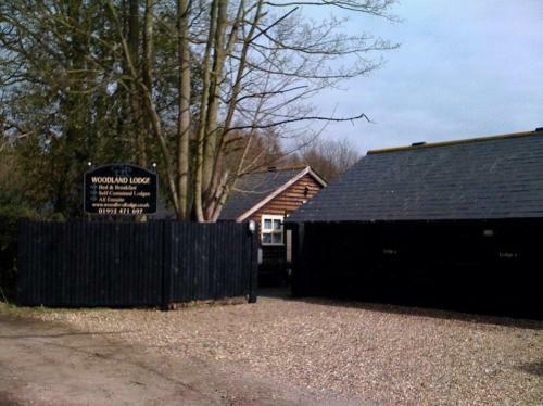 Hostal Woodland Lodge