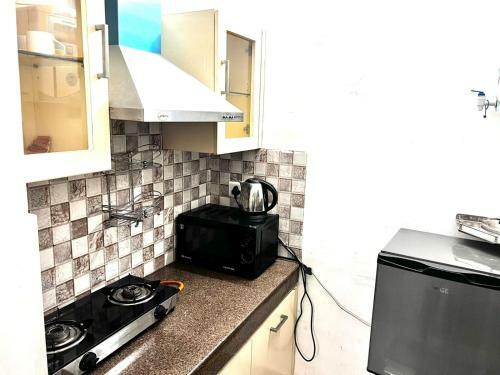 Apartamento Sandwoods Windsor Suites
