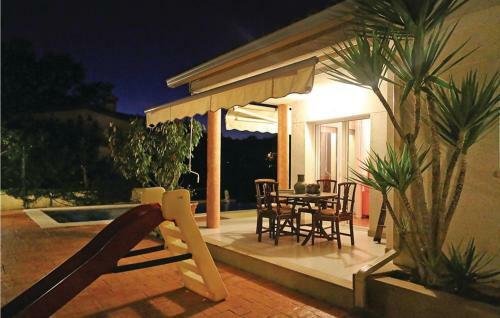 Four-bedroom Holiday Home In Calonge
