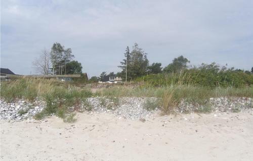 Four-bedroom Holiday Home In Beddingestrand