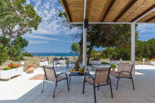 Beach House By The Sea